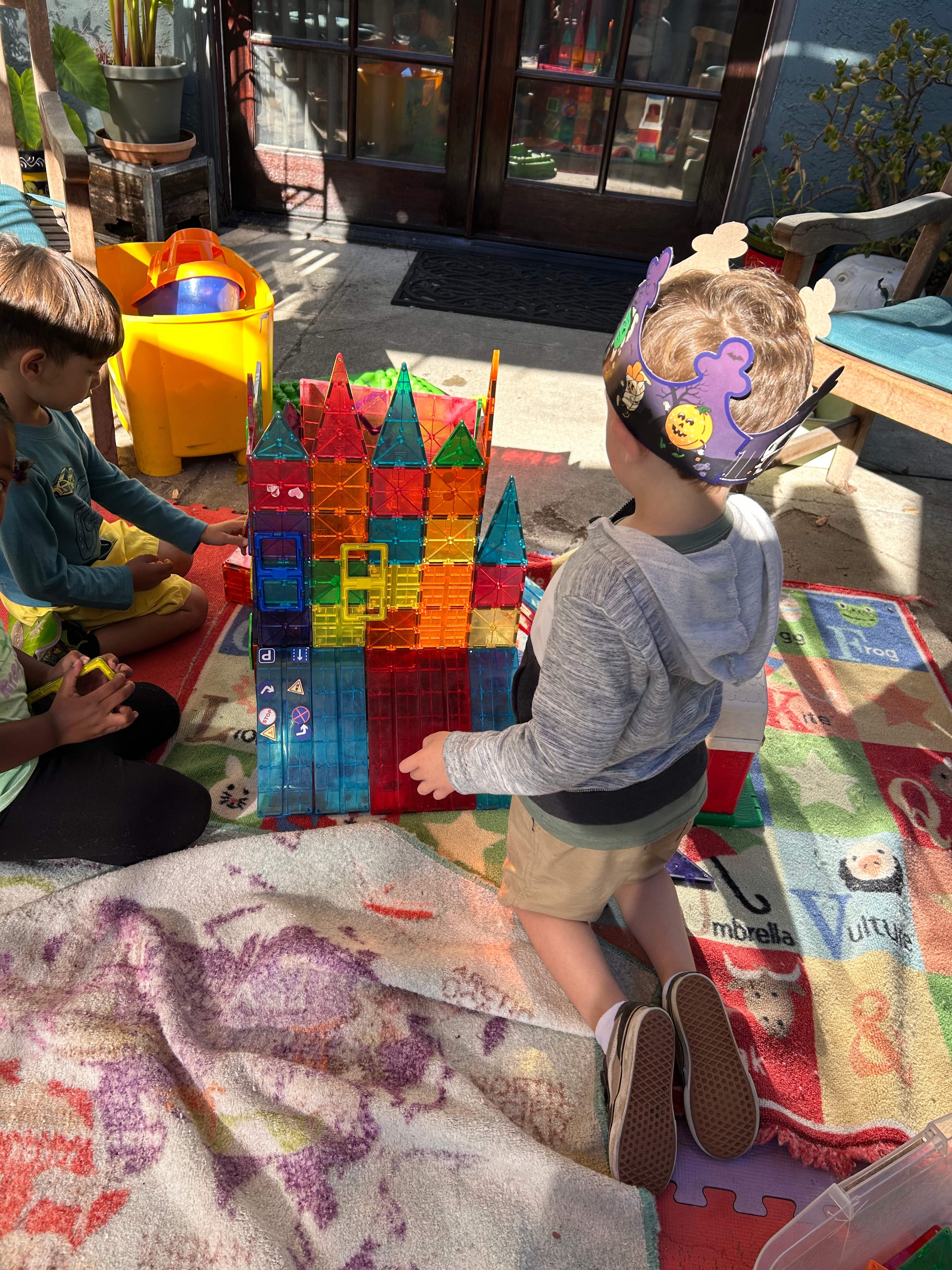 Children engaged in learning activities at Little Crumbles